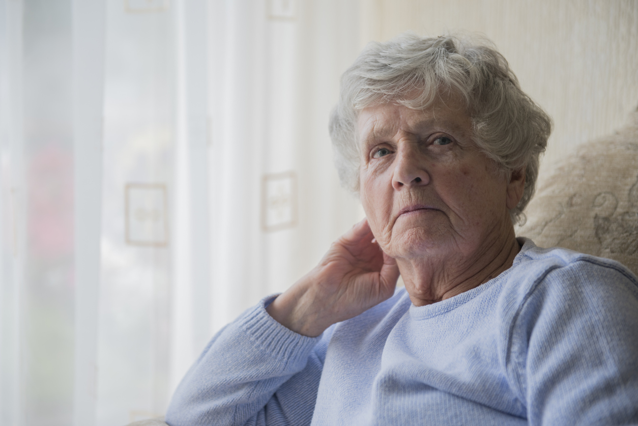 Senior woman indoors looking upset and bored Don't Ignore These Common Signs Of Nursing Home Negligence