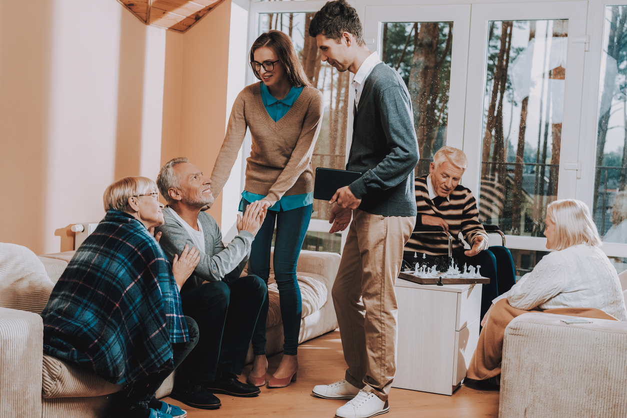 Happy. Young People. Visit. Older Man and Woman. Nursing Home Abuse | Take Action Against Nursing Home Abuse