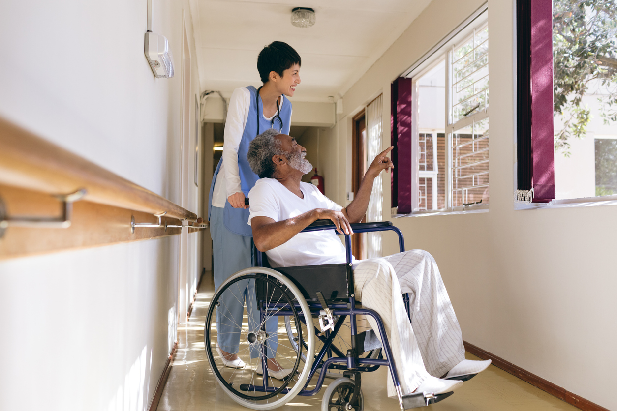 Female nurse and senior male patient interacting Violating Residents' Rights Could Lead To Assisted Living Negligence Lawsuits